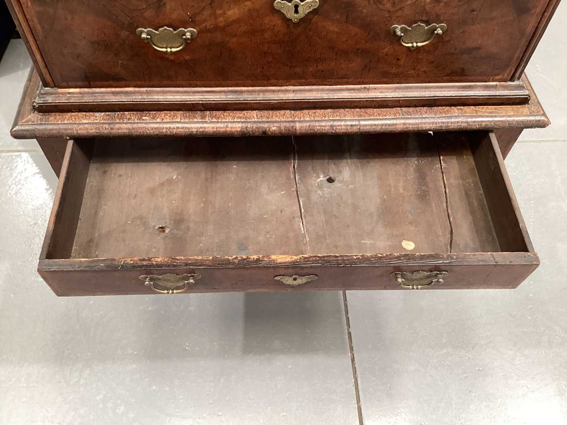 A 17th-century and later figured walnut chest on stand, the upper section with quarter veneered top  - Image 22 of 22