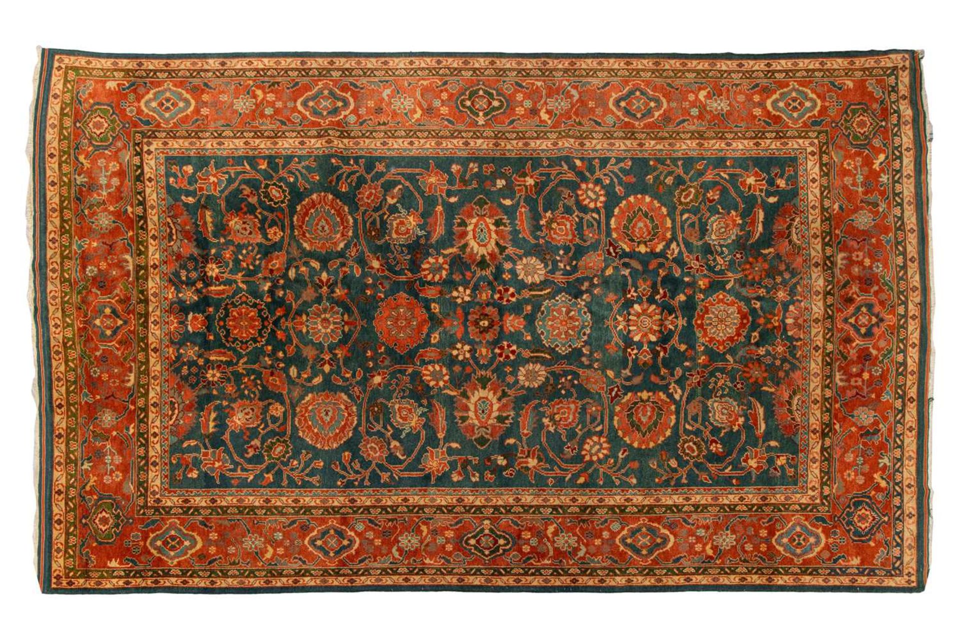A large Ushak Carpet, the red palmette and leaf design on a blue/green field, within a light red bor