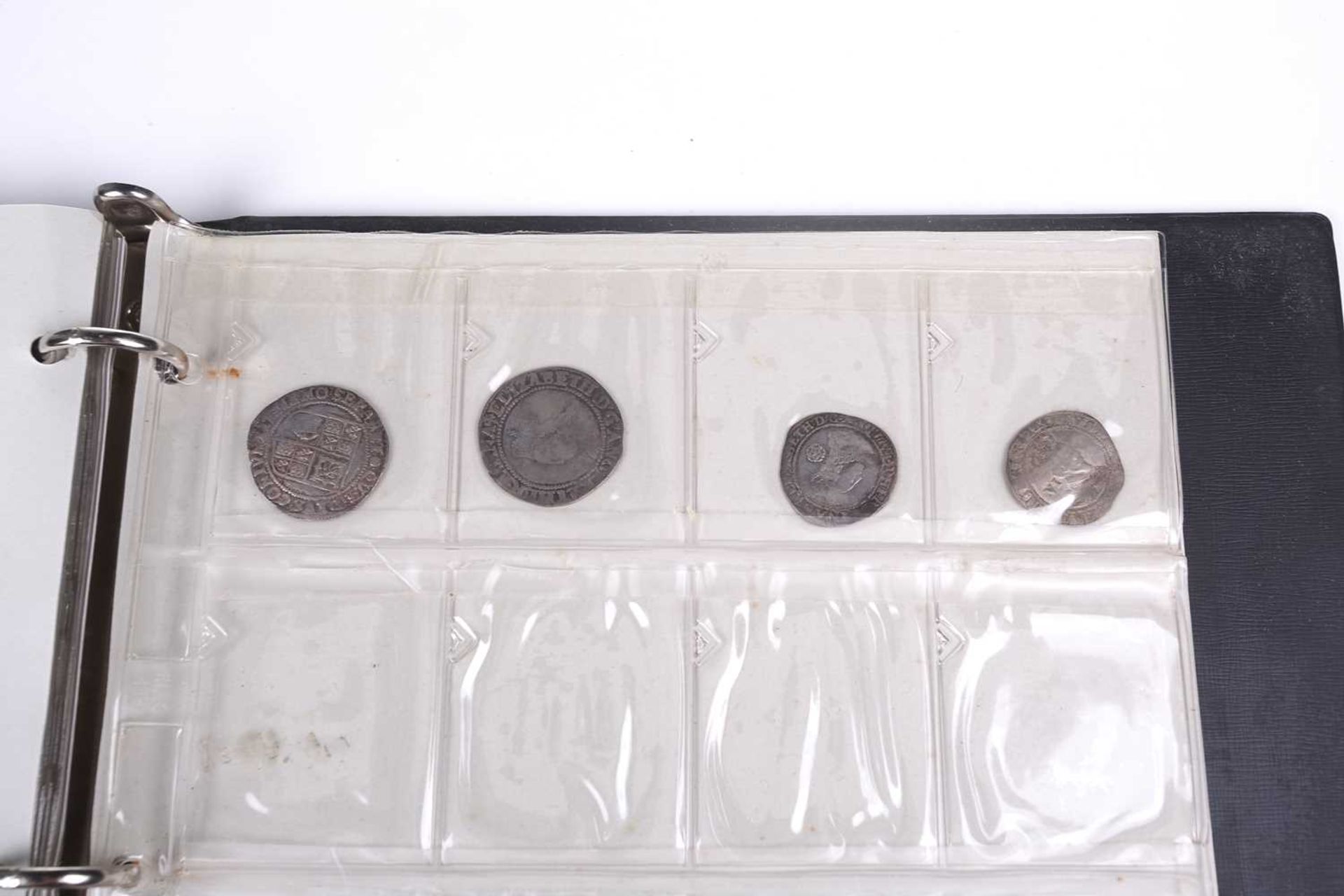 An album containing a collection of coins, George II and later, to include silver crowns and coins,  - Bild 16 aus 20