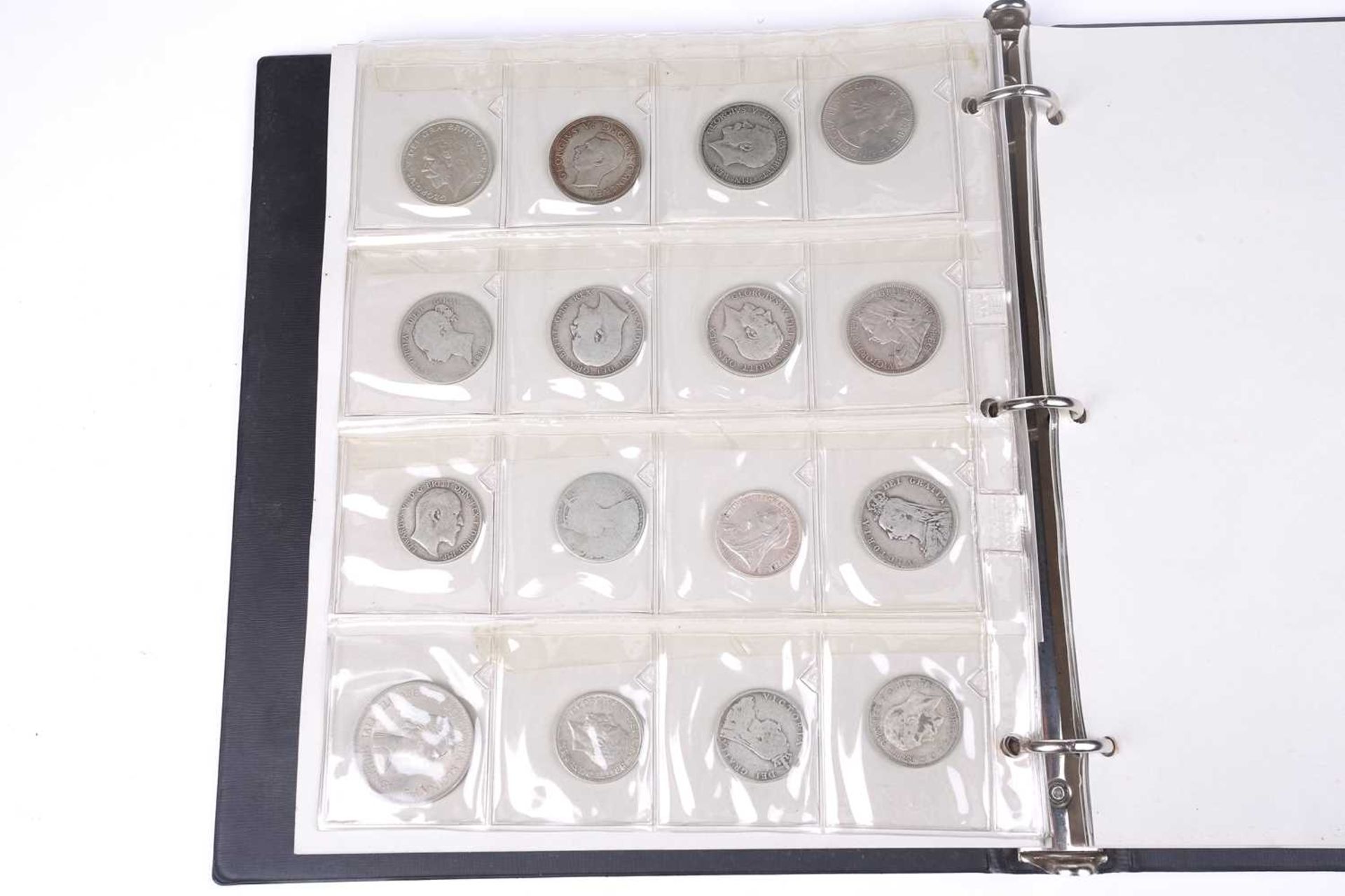 An album containing a collection of coins, George II and later, to include silver crowns and coins,  - Image 11 of 20