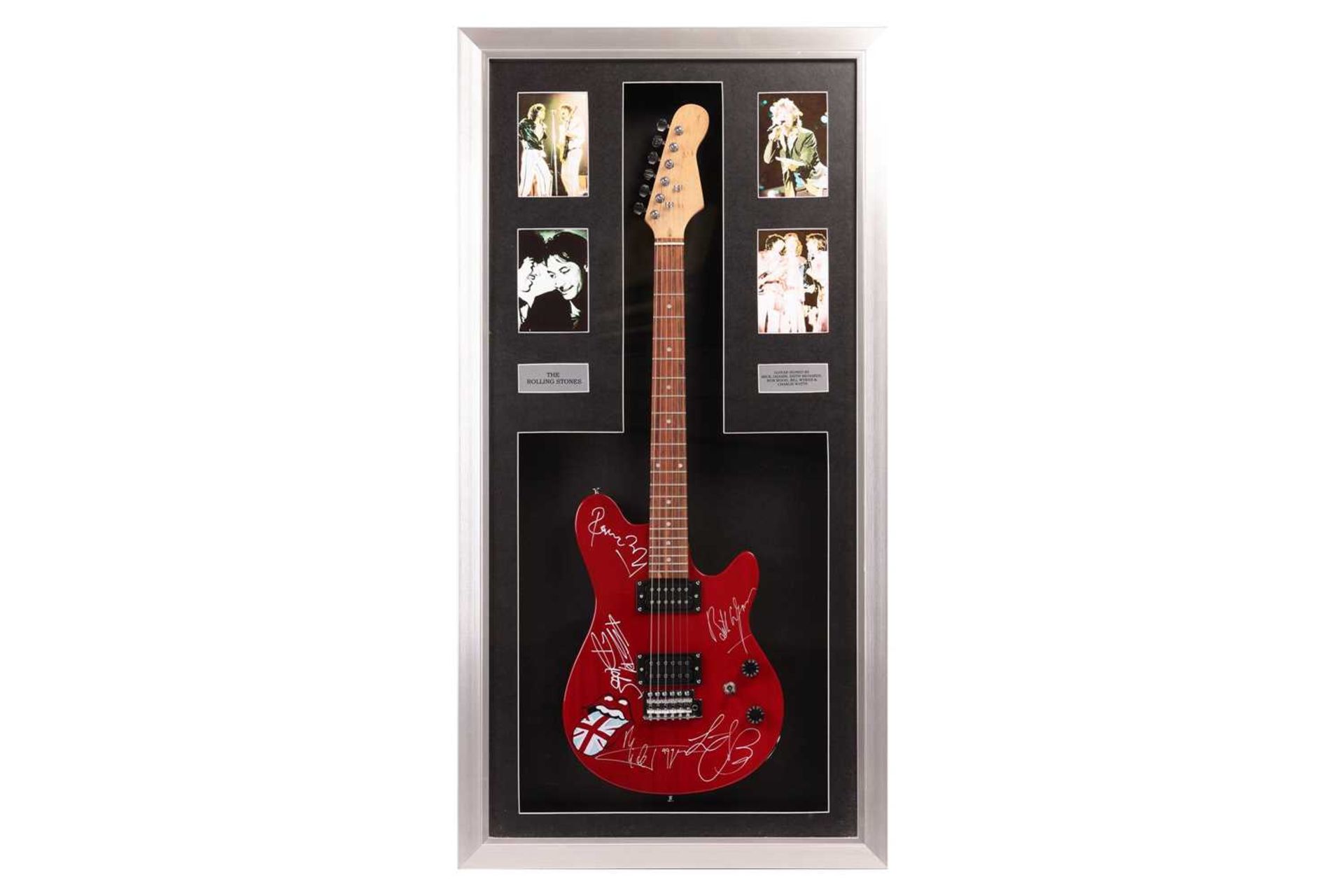 The Rolling Stones: an electric guitar signed by Mick Jagger, Ronnie Wood, Keith Richards, Bill Wyma