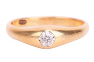An old-cut diamond solitaire ring, flush-set with an old-cut diamond of 3.9 x 3.9 x 2.5 mm, with