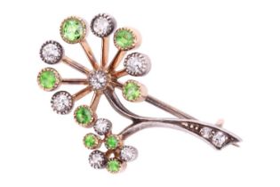 A diamond and tsavorite garnet spray brooch, designed in the form of a dandelion seed head with