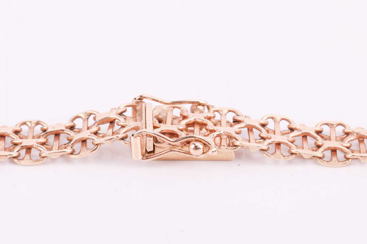 A bismark mesh link necklace in 9ct rose gold, graduated from the centre, completed with a concealed - Image 2 of 3