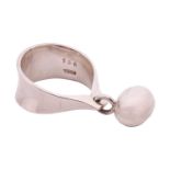 Georg Jensen - 'Pod' ring, dangling with a hollow egg-shaped charm attached to a concave ring band, 