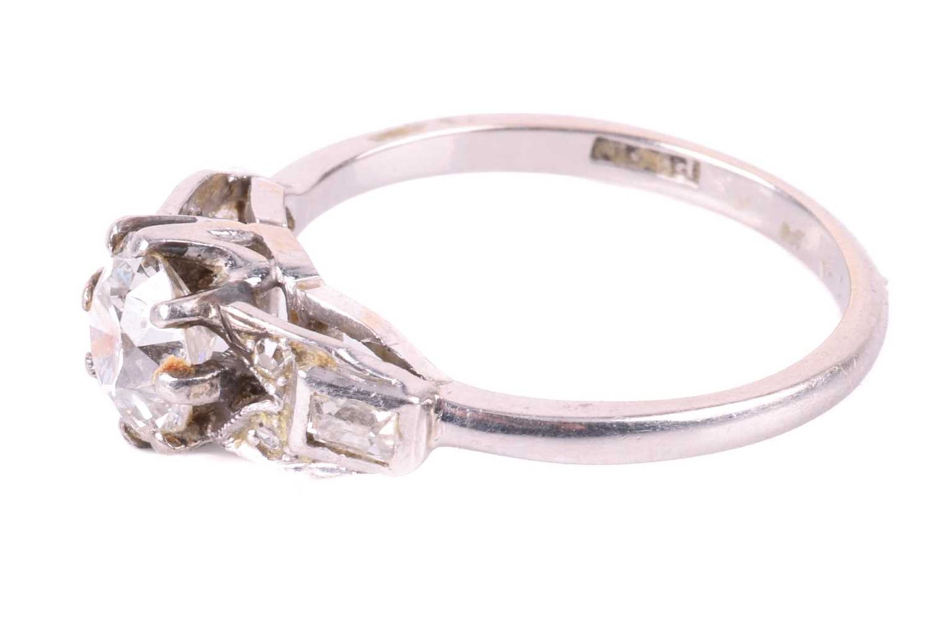 An old cut diamond solitaire ring with diamond set shoulders, circa 1920s, featuring a round old cut - Image 3 of 5