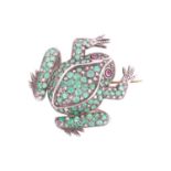 A frog brooch set with emeralds, diamonds and rubies, sculpted in a resting position, body covered w