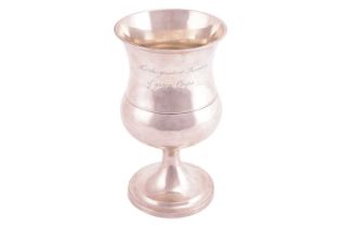 A George III silver trophy goblet, by Samuel Hennell, London 1811, of baluster shape with flared rim