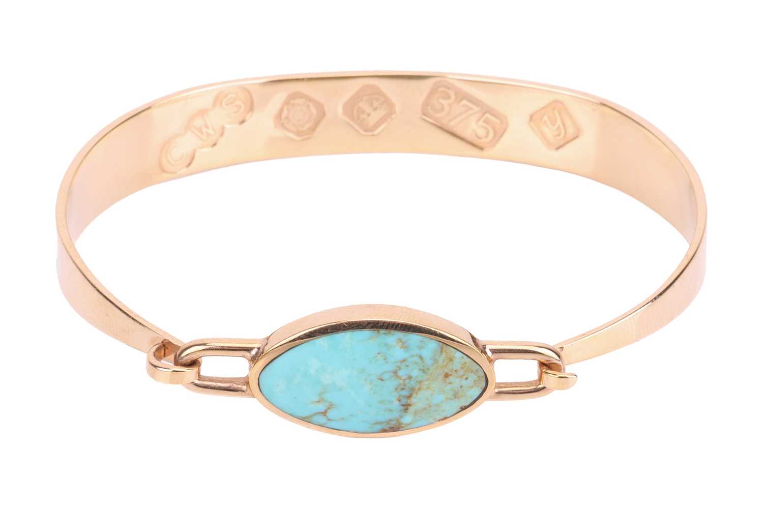 A turquoise-set bangle in 9ct yellow gold, tension clamp opening bracelet featuring a navette-shaped - Image 3 of 5