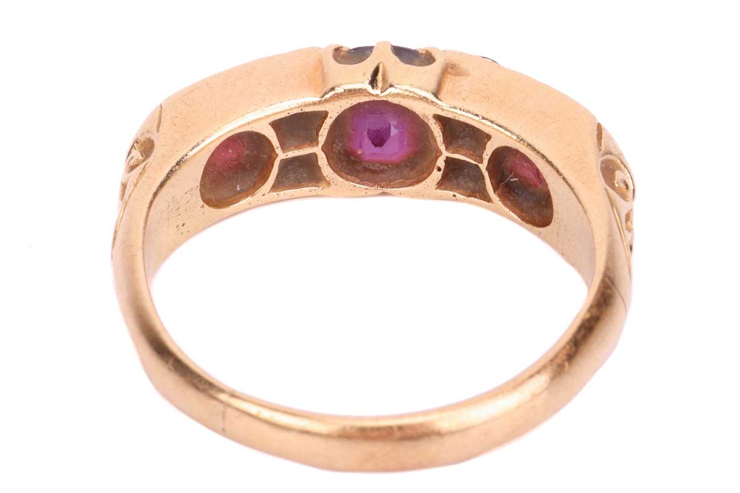 A late Victorian ruby and diamond half-hoop ring in 18ct gold, comprising three graduated circular-s - Image 4 of 5