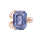 An unheated colour-change Ceylon sapphire solitaire ring, featuring an octagonal step-cut sapphire o