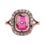 A diamond and synthetic ruby panel ring, centred with an empty cushion-shaped synthetic ruby panel, 