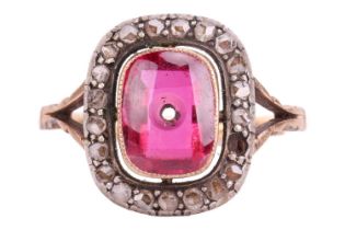 A diamond and synthetic ruby panel ring, centred with an empty cushion-shaped synthetic ruby