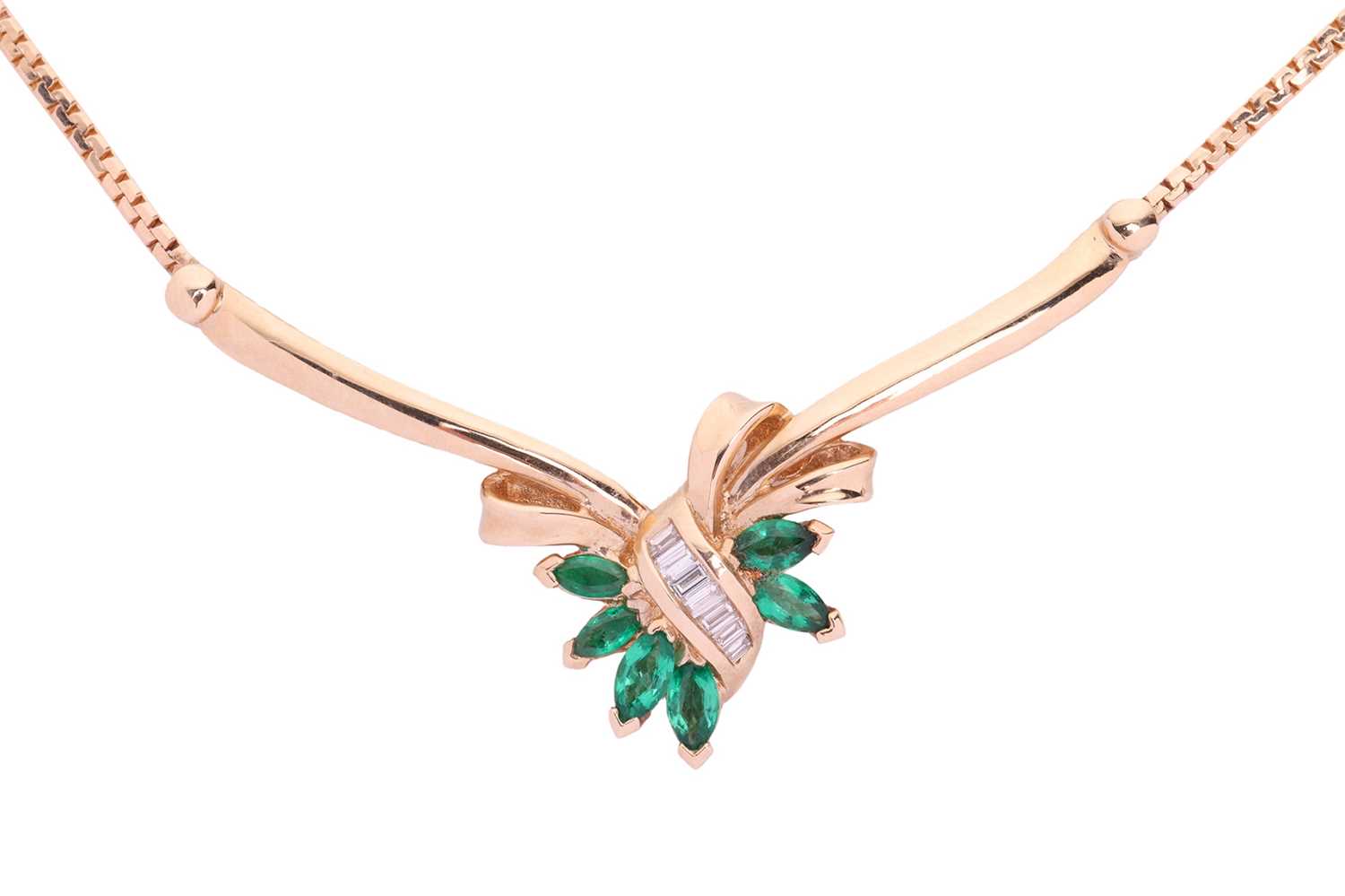 An emerald and diamond-set bow necklace, the marquise-cut bright green emeralds set in a foliate des