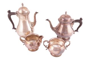 A four-piece silver tea service in George II style, by Barker Ellis Silver Co., Sheffield 1979, comp