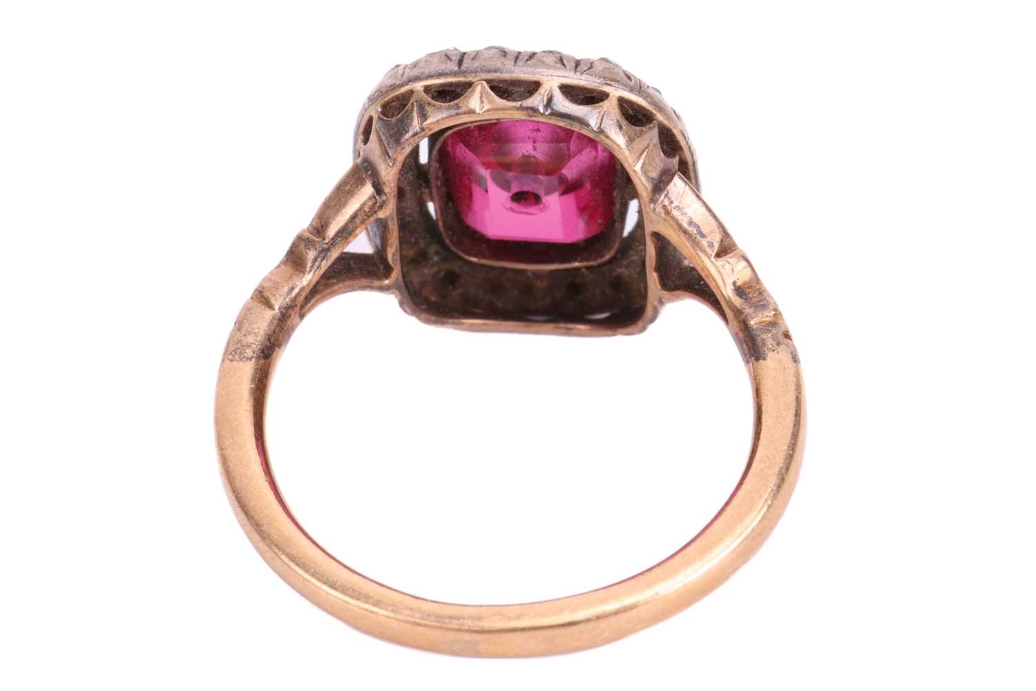 A diamond and synthetic ruby panel ring, centred with an empty cushion-shaped synthetic ruby panel,  - Image 4 of 4