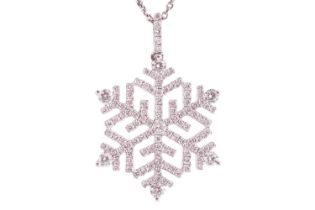 A diamond snowflake pendant on chain, set throughout with round brilliant cut diamonds, with a total