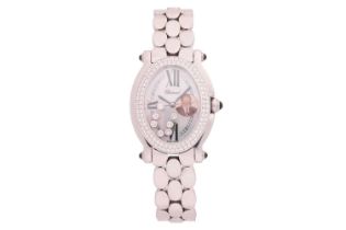 A Chopard Happy Sport diamond set oval lady's wristwatch Model: 27/8953-23 Serial: 1151980 Case