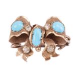 A gem-set bow brooch, set with three turquoise cabochons in cut-down mounts, and further decorated w