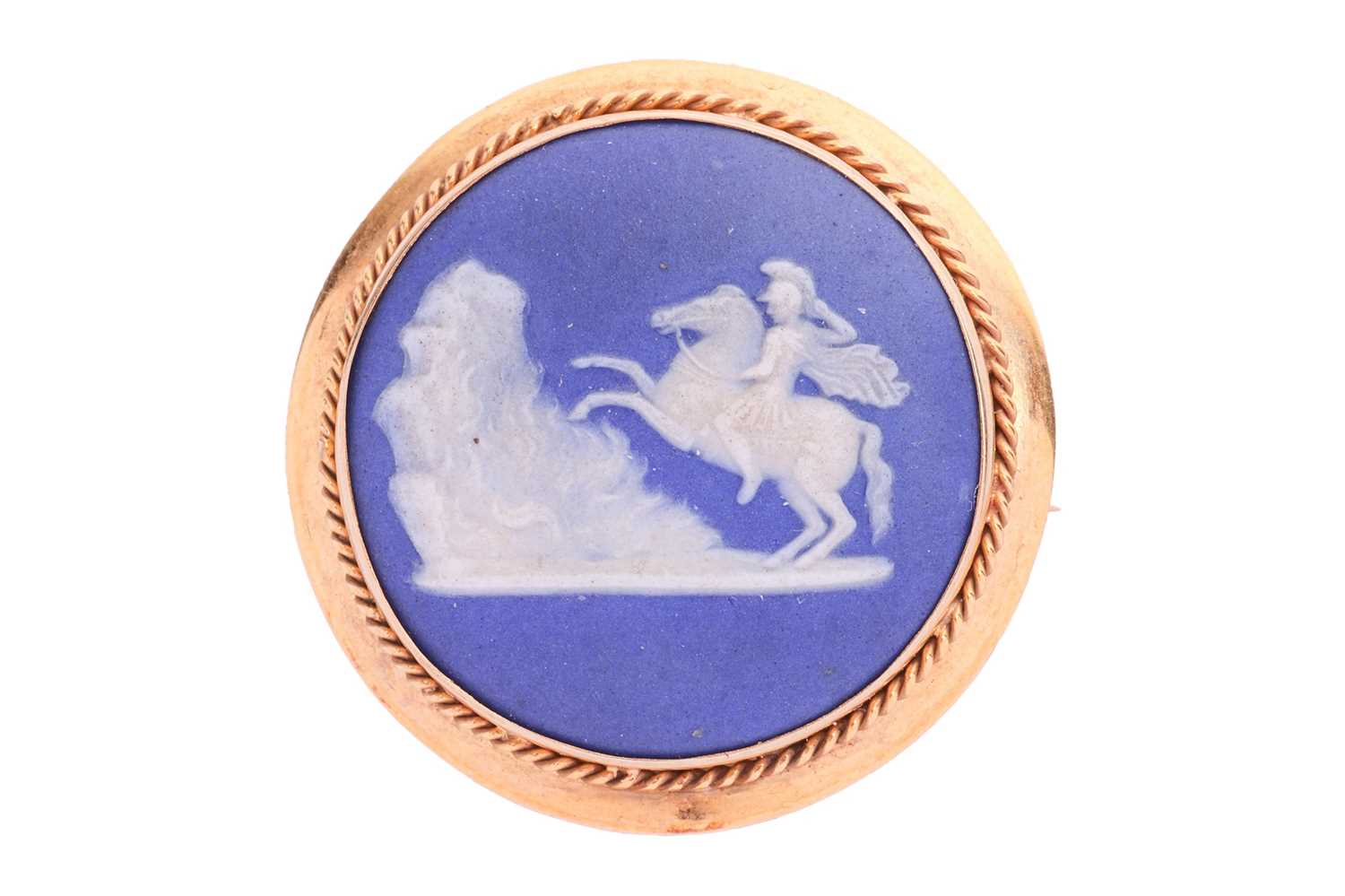 A Victorian Wedgwood Jasperware brooch, of circular form, depicting Marcus Curtius on horseback leap