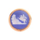 A Victorian Wedgwood Jasperware brooch, of circular form, depicting Marcus Curtius on horseback leap