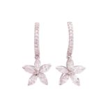 A pair of diamond floral earrings, each designed as a diamond set hoop suspending a marquise diamond