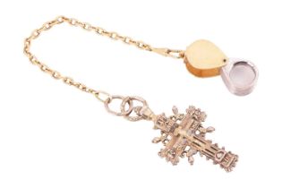 An 18ct gold jeweller's loupe with silver gilt Orthodox cross pendant, the loupe in two-toned gold