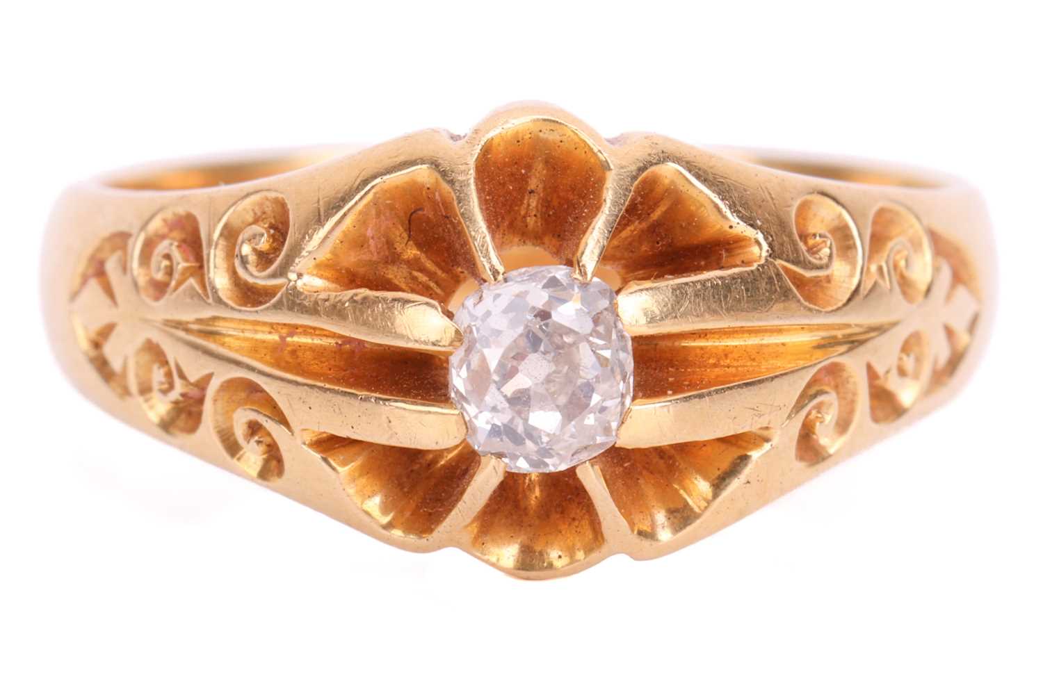 An Edwardian diamond gypsy ring in 18ct yellow gold, comprising a cushion-shaped old-cut diamond of 