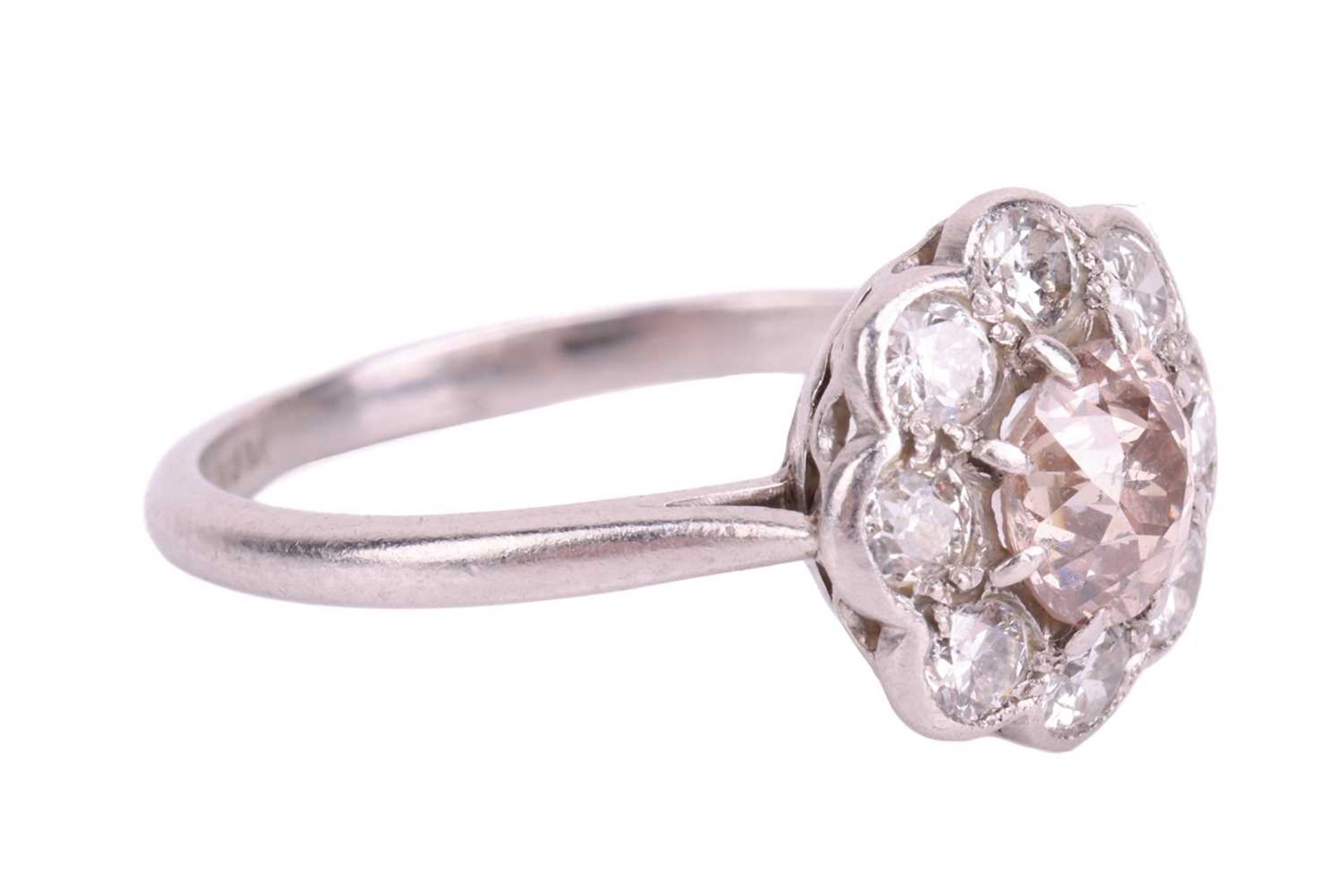 An Edwardian diamond daisy cluster ring, centred with an old European round diamond of "Very Light P - Image 2 of 4