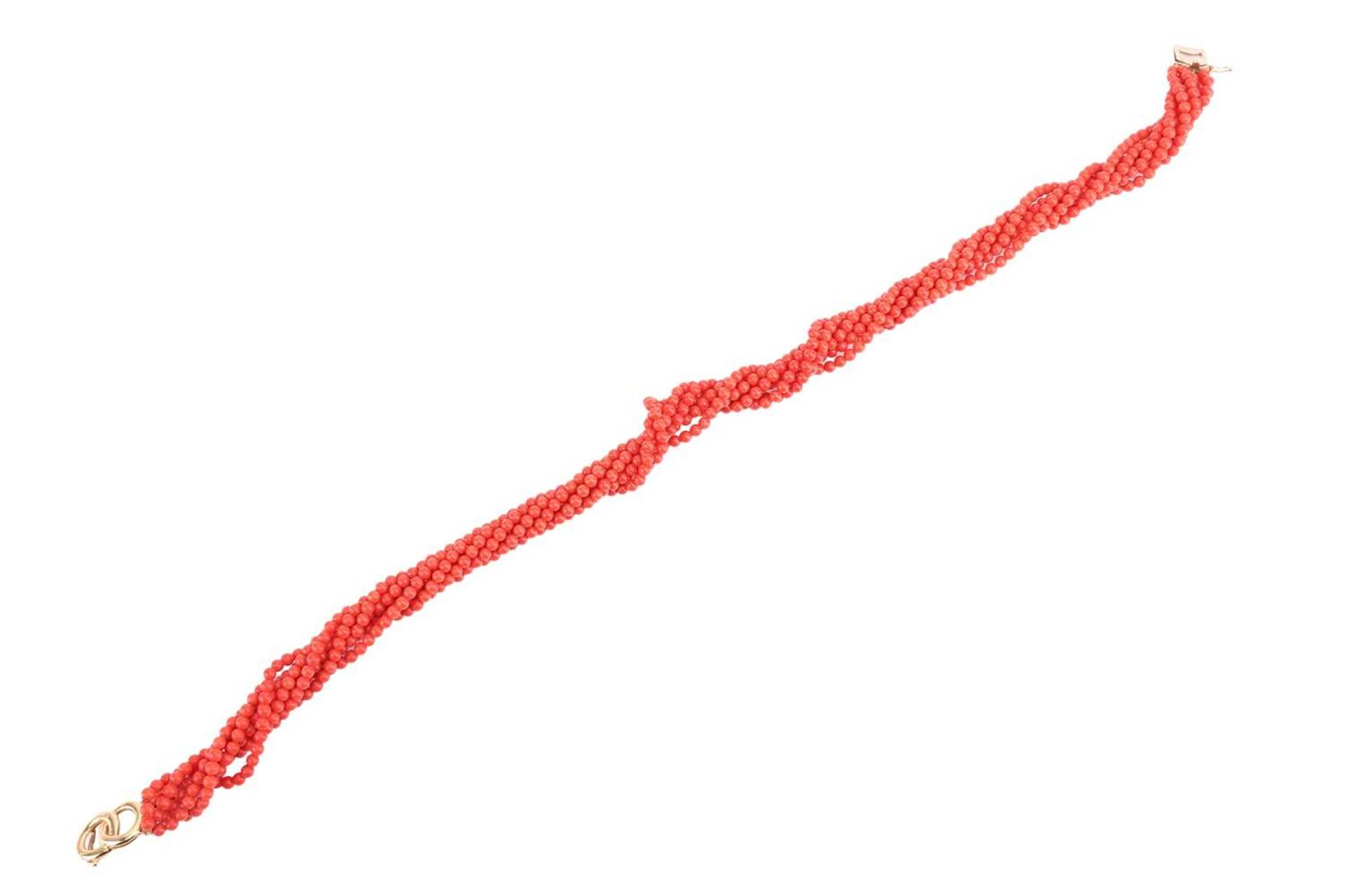 A coral torsade necklace, comprising seven strands of coral beads, completed with a clasp of annular - Image 2 of 4