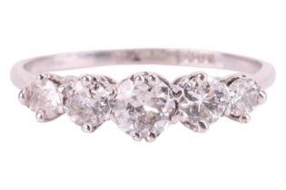 A diamond five-stone ring, featuring a row of old cut and brilliant cut diamonds with a total