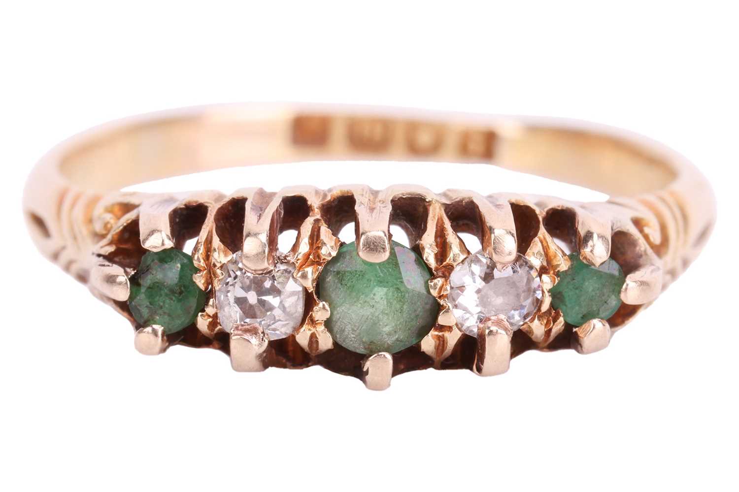 An Edwardian emerald and diamond half-hoop ring in 18ct gold, comprising three graduated circular-cu