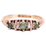 An Edwardian emerald and diamond half-hoop ring in 18ct gold, comprising three graduated circular-cu