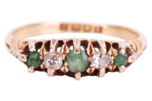 An Edwardian emerald and diamond half-hoop ring in 18ct gold, comprising three graduated circular-