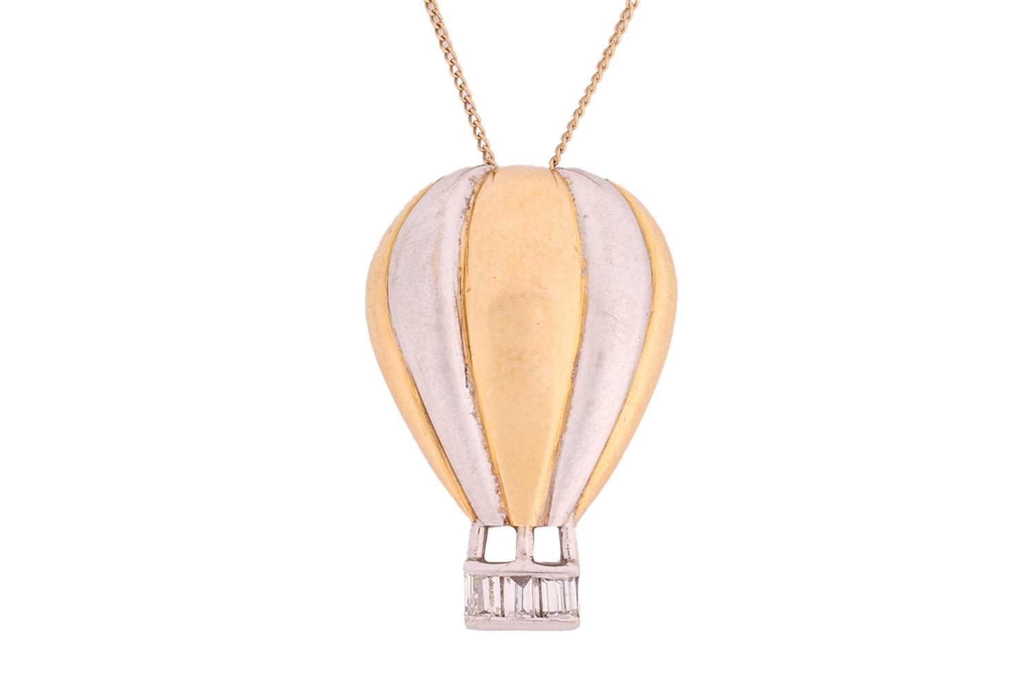 A two-toned hot air balloon pendant on chain, the gondola underneath channel-set with baguette-cut d