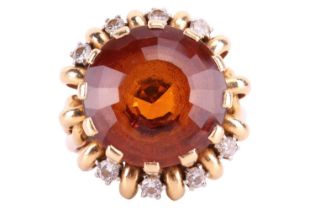 Carl Bucherer - a citrine and diamond dress ring, the round faceted citrine in claw setting above