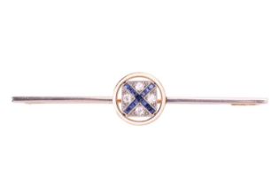 A Saint Andrew's Cross, bar brooch, octagonal panel calibré-set with sapphires and old-cut