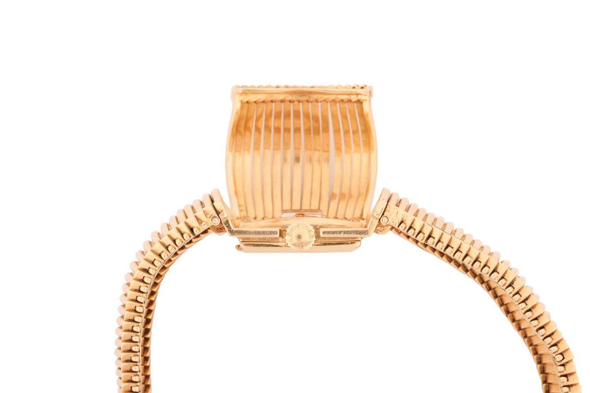 Longines. An 18 carat gold cocktail watch with concealed dial. The square champagne dial with applie - Image 3 of 6
