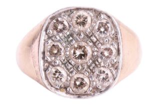 A diamond ring, featuring a cluster of round brilliant cut diamonds to the central panel, with a