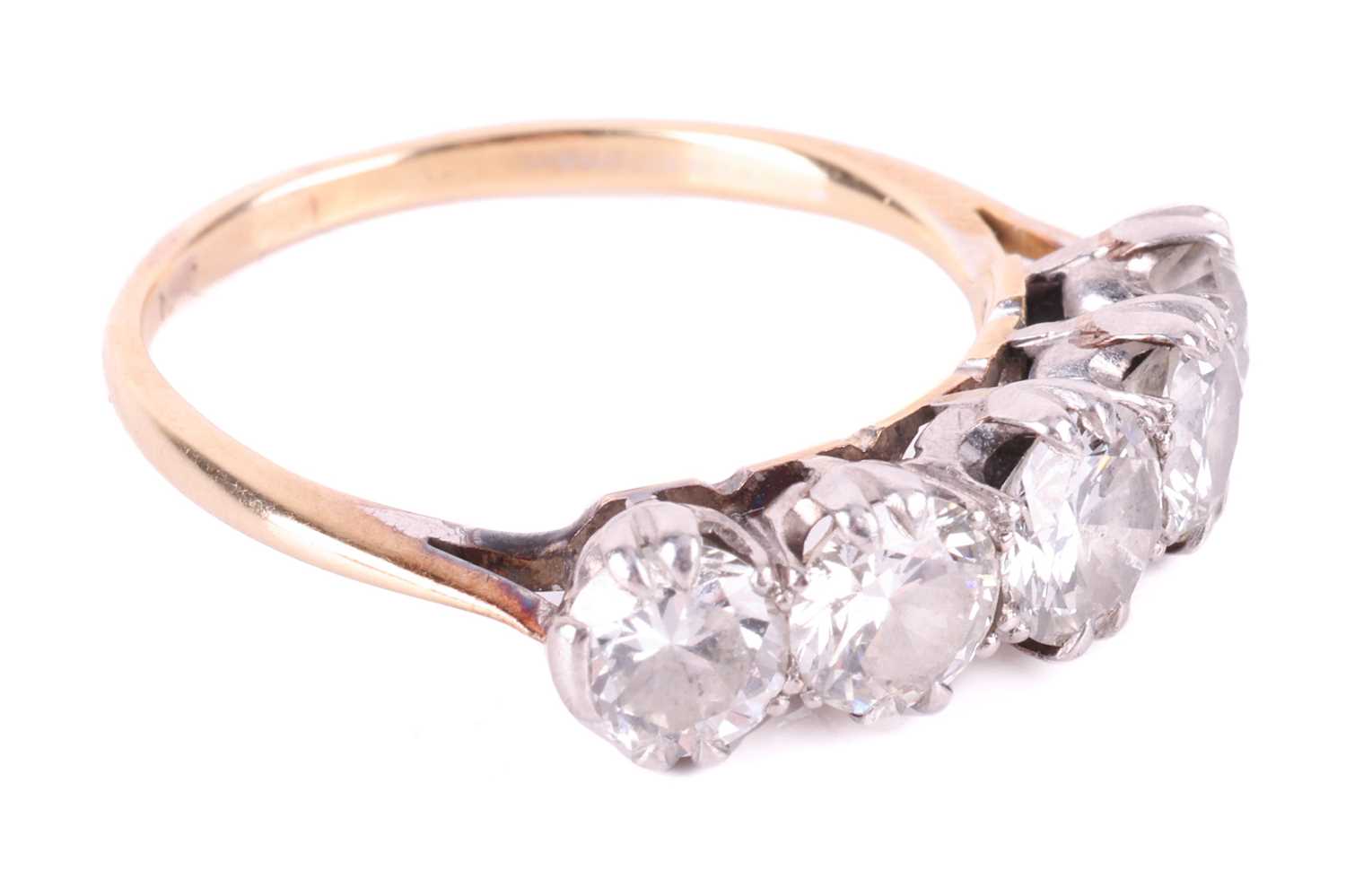 A diamond five-stone ring, featuring a row of round brilliant cut diamonds with a total estimated we - Image 2 of 6