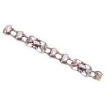 Georg Jensen - a floral link bracelet with bead details, openwork links chased and embossed with tex