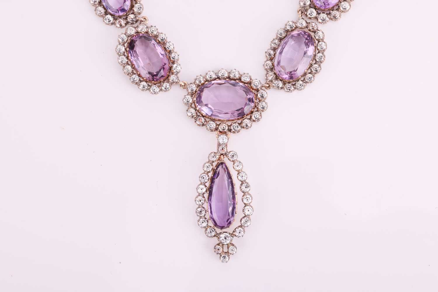 An early to mid 19th-century amethyst and rock crystal parure; comprising a necklace with detachable - Image 4 of 13