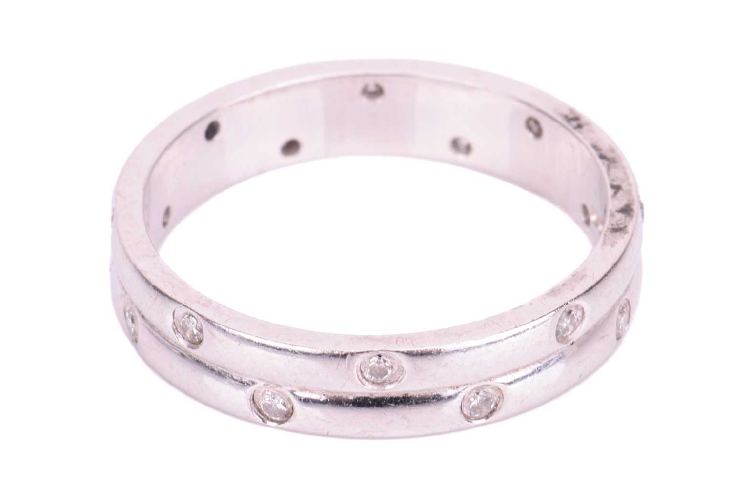 An 18ct white gold diamond-set ring, the double row band flush-set with sixteen round brilliant diam - Bild 3 aus 4