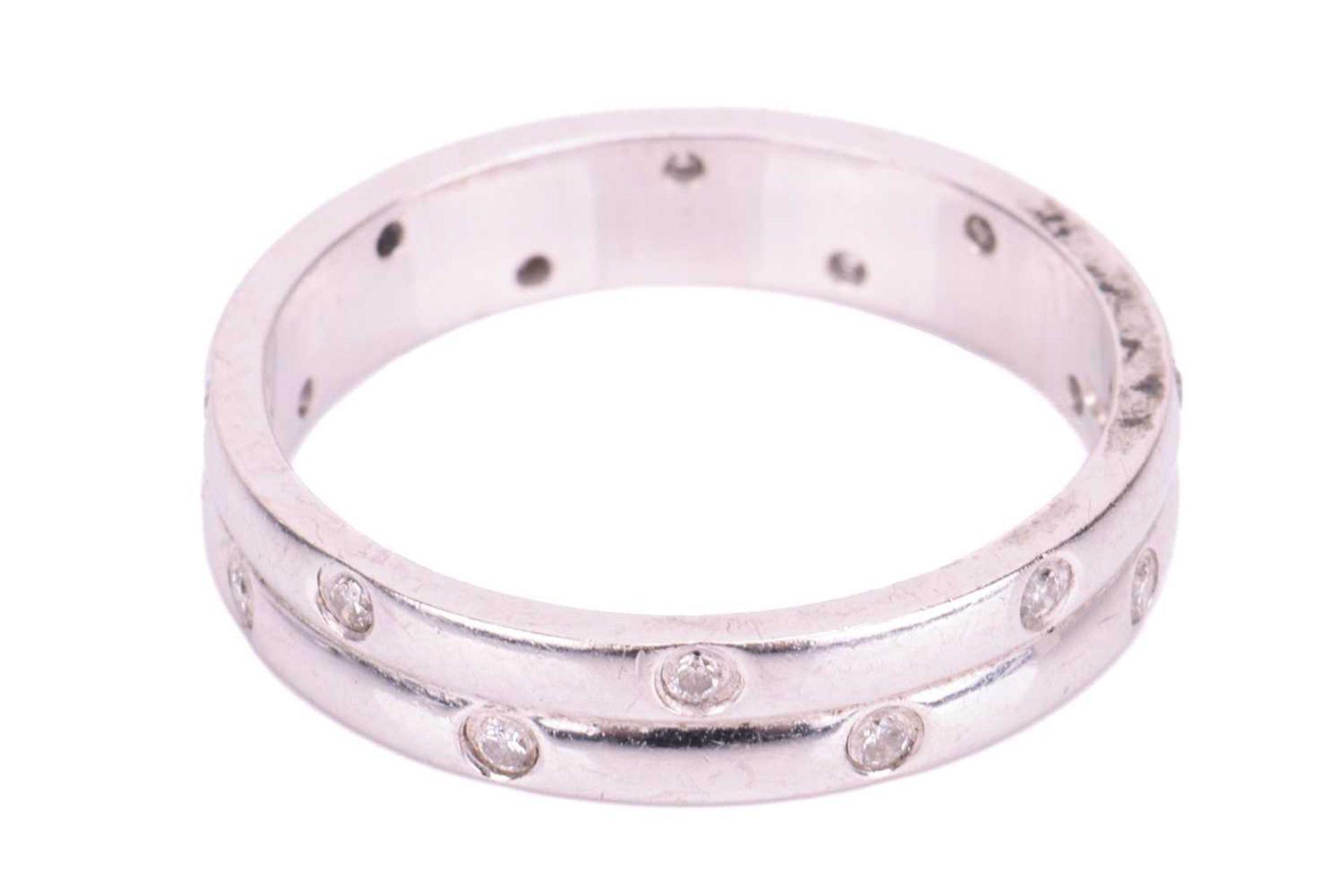 An 18ct white gold diamond-set ring, the double row band flush-set with sixteen round brilliant diam - Image 3 of 4