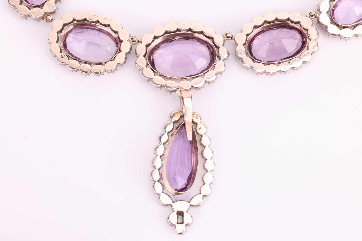 An early to mid 19th-century amethyst and rock crystal parure; comprising a necklace with detachable - Image 5 of 13