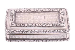 A George IV silver snuff box by Nathaniel Mills, Birmingham 1828, of rectangular form, fully embelli