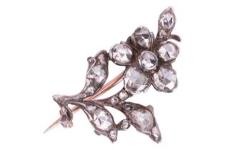 An Early Victorian diamond-set floral spray pin, encrusted with rose-cut diamonds in closed-back