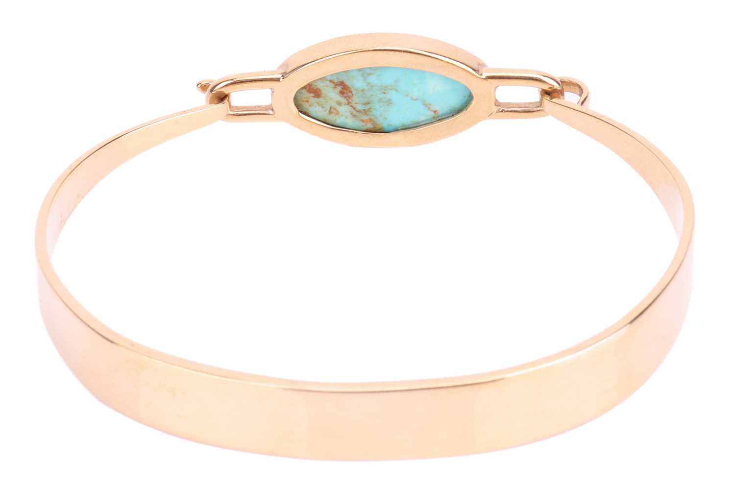 A turquoise-set bangle in 9ct yellow gold, tension clamp opening bracelet featuring a navette-shaped - Image 4 of 5