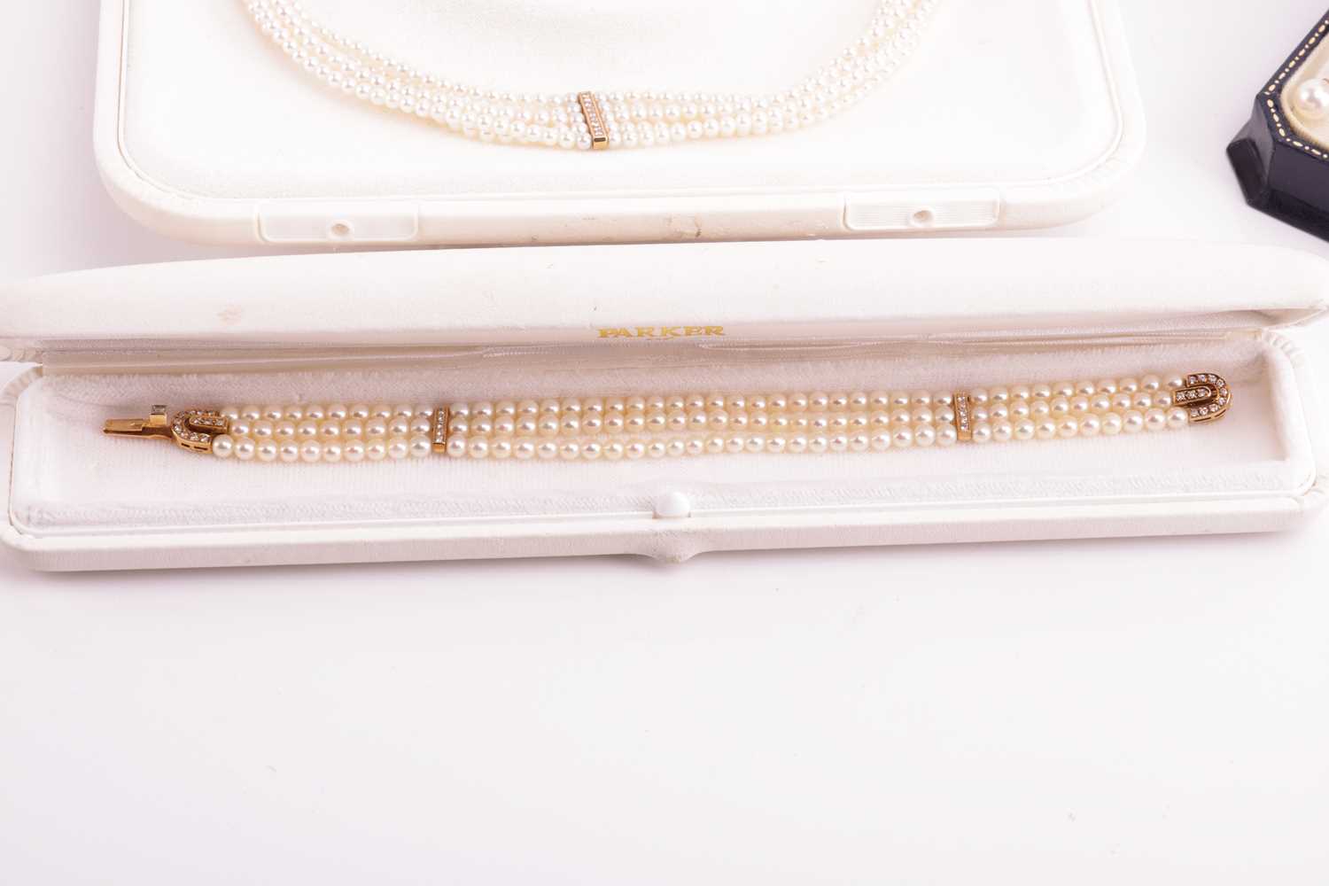 A cultured pearl necklace, bracelet and earrings suite; the necklace strung with five strands of 3mm - Image 2 of 4