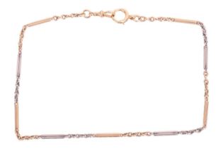 A two-toned fetter link Albert chain, consisting of reeded bar links in alternating coloured